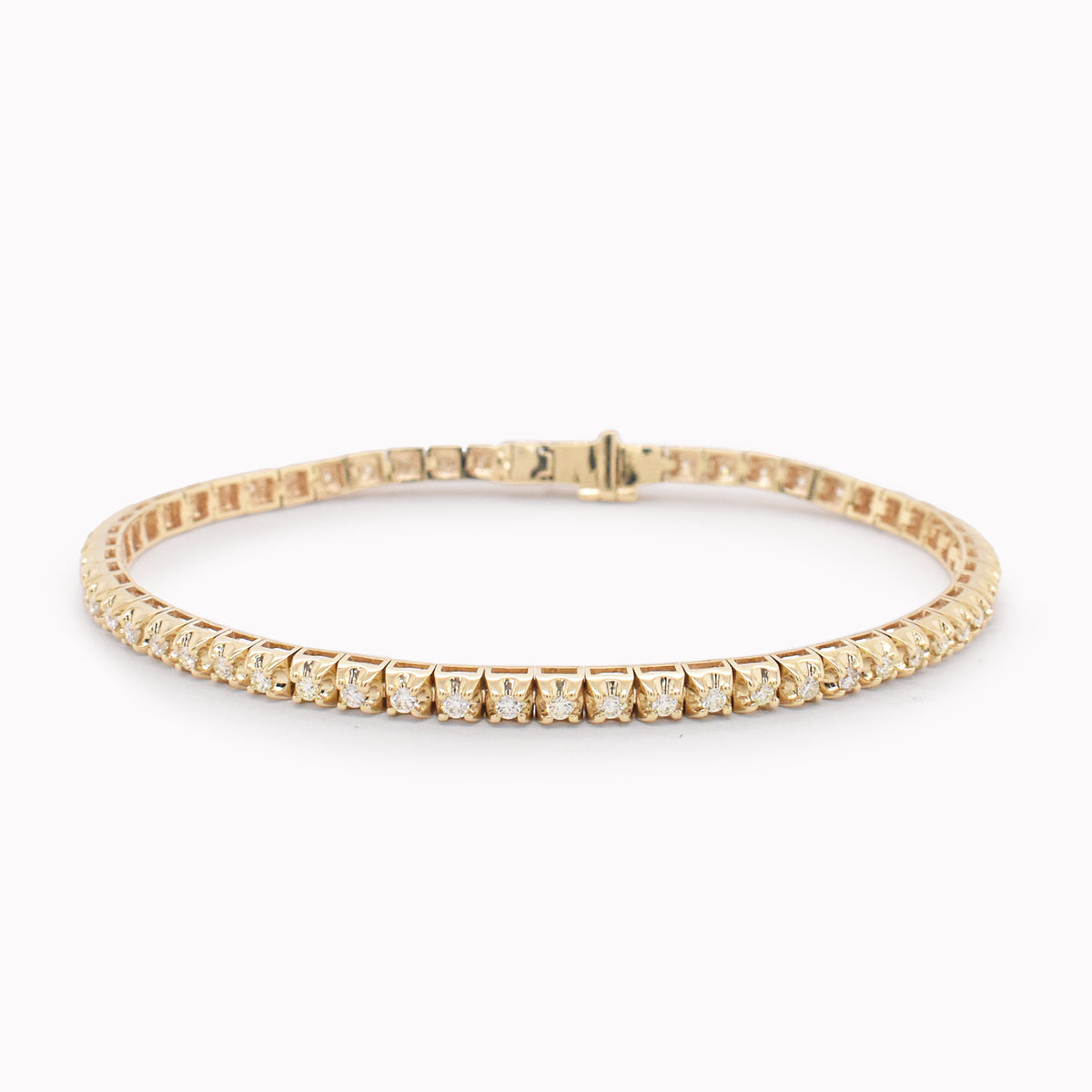 Yellow Gold Illusion Riviere Tennis Bracelet
